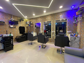 The Gentlemen's Salon interior with barber chairs and mirrors